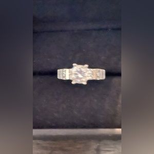 Sterling silver engagement ring with CZ’s